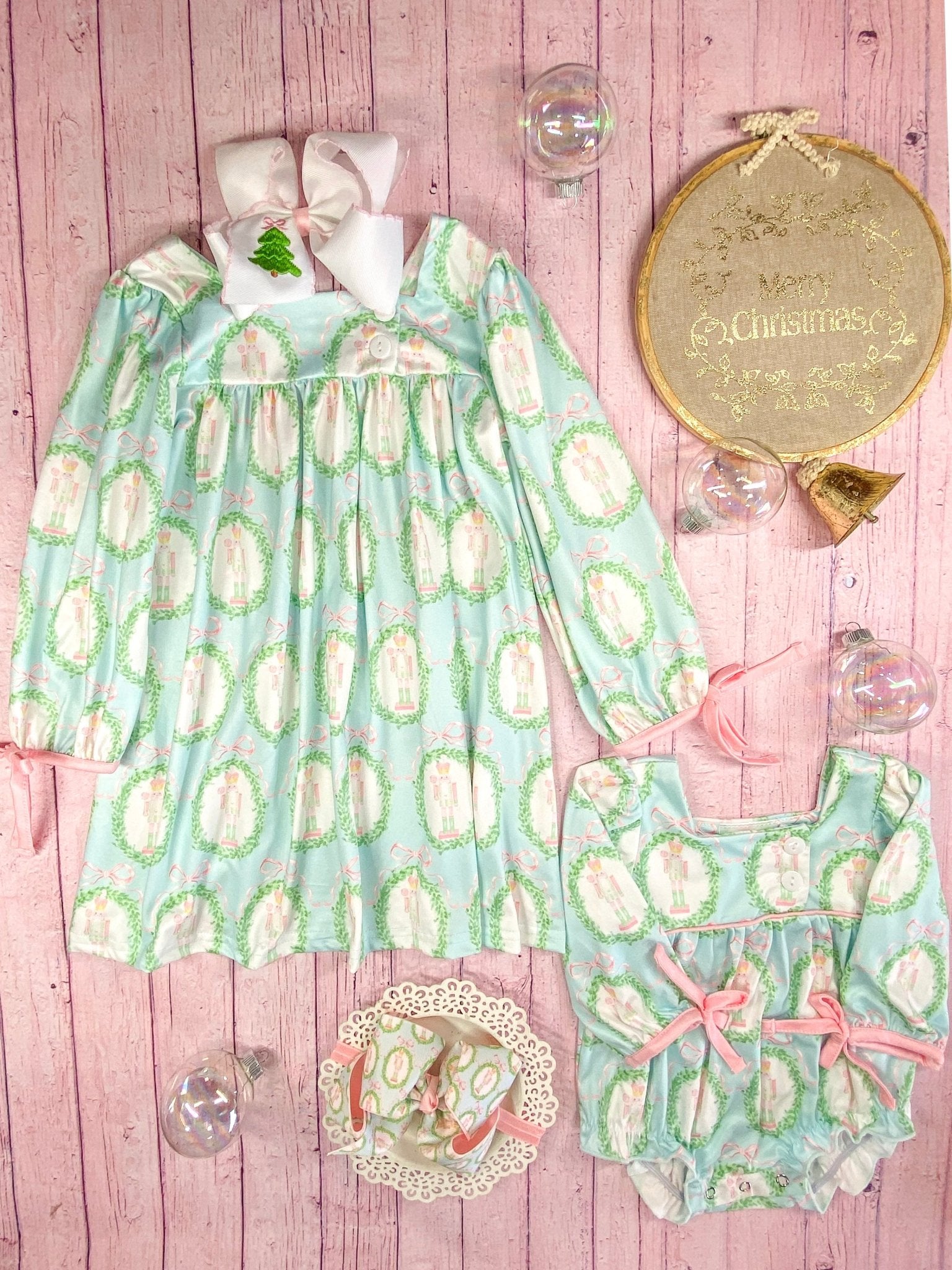 Nutcracker & Tied Long Sleeves Dress next to matching infant romper