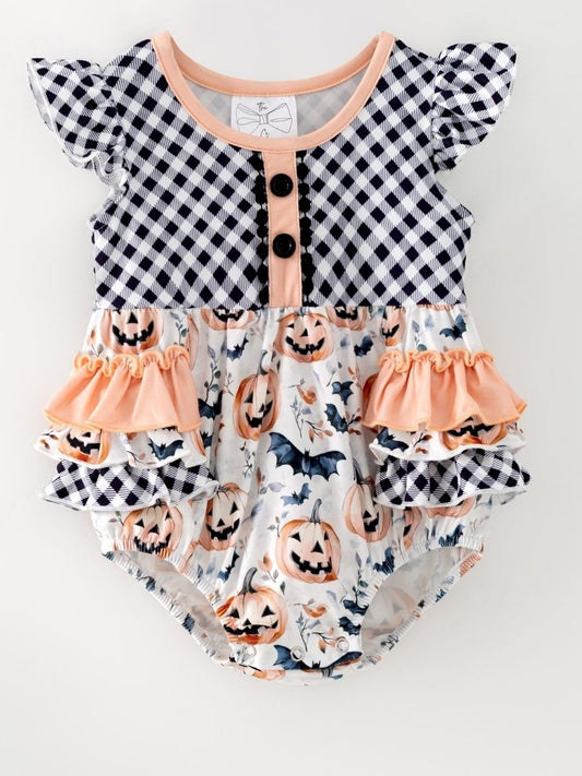 baby girl Halloween one-piece with jack-o-lantern print and plaid ruffle tiers