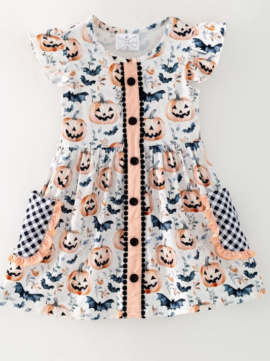 girls Halloween dress with jack-o-lantern bat print and check ruffle pockets
