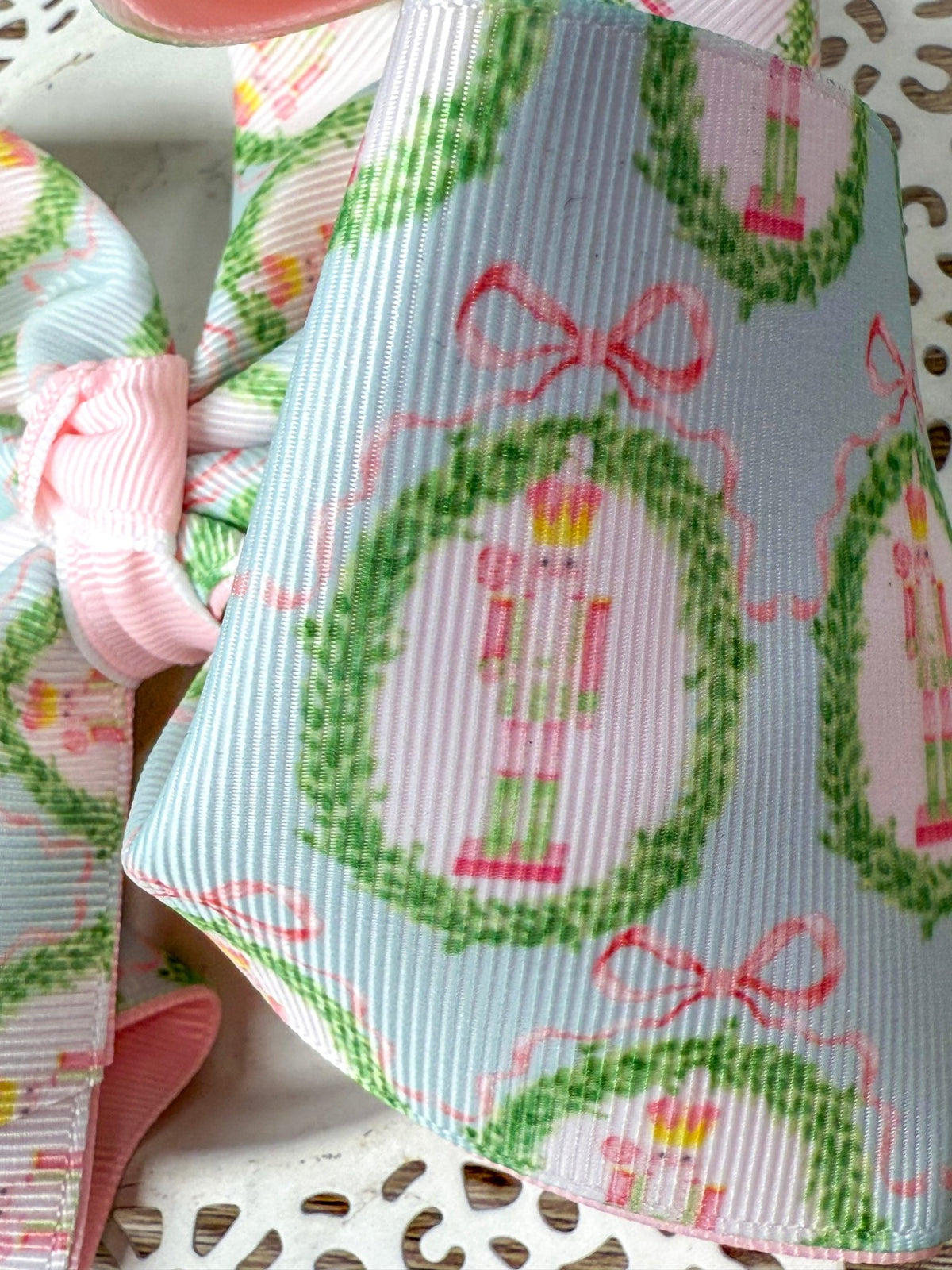 Close-up of pastel nutcracker print on double layer bow