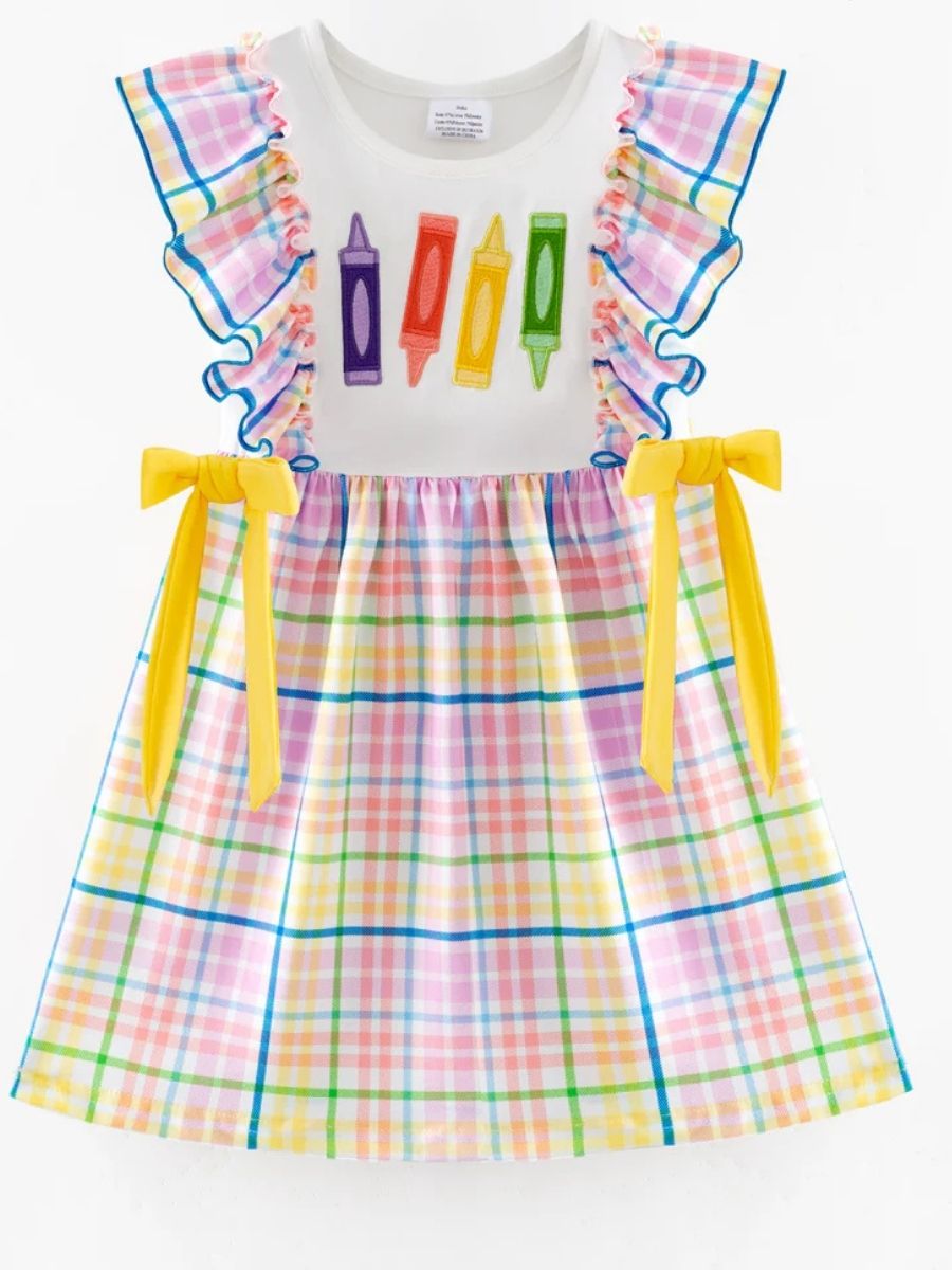 Girls back to school boutique dress with crayon appliqué, rainbow plaid ruffle sleeves, yellow bow ties, and plaid skirt