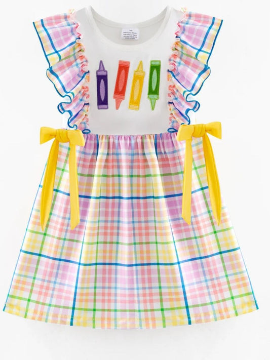 Girls back to school boutique dress with crayon appliqué, rainbow plaid ruffle sleeves, yellow bow ties, and plaid skirt