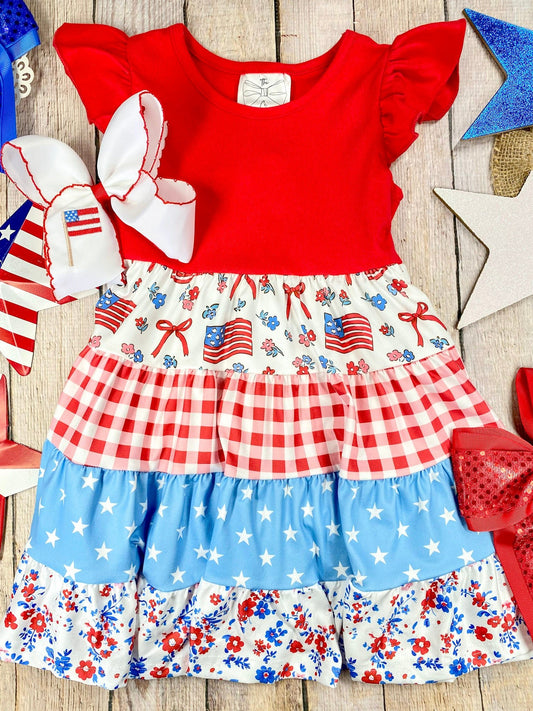 Patchwork Twirl Dress on a wooden background