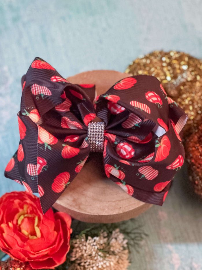 fall hair bow with pumpkins and rhinestone center