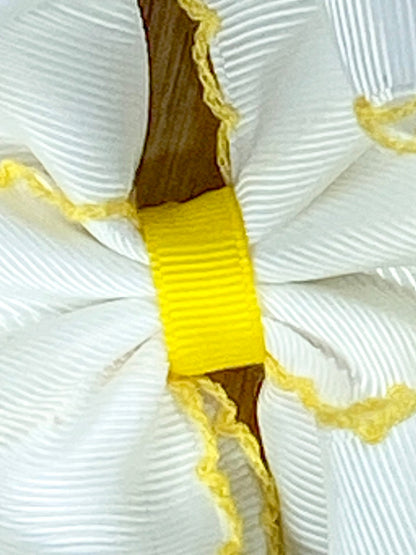 Close up of bow center on Pencil Embroidered Moonstitch Headband
