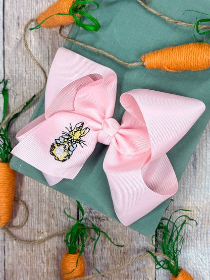Peter Cottontail embroidered light pink hair bow made from grosgrain ribbon with bunny embroidery