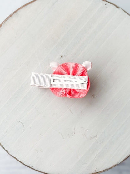 Back of bow with single prong alligator clip