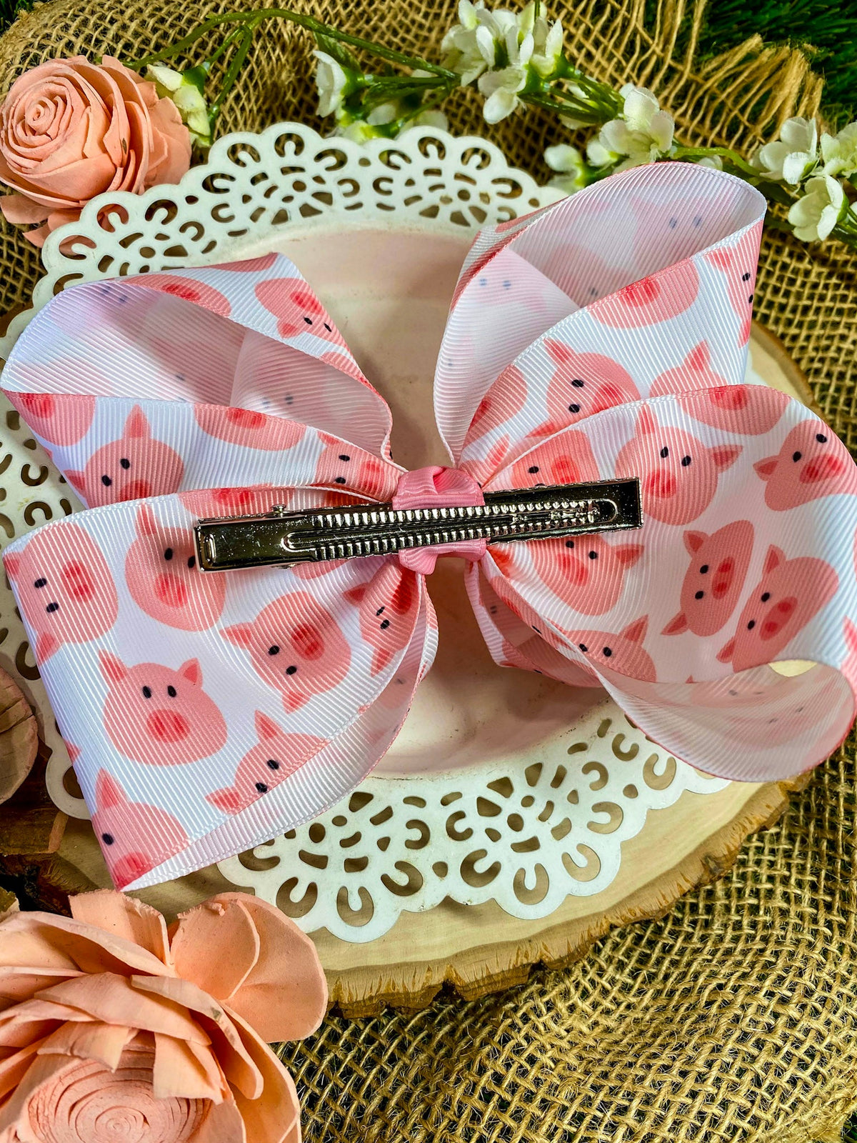 Pink pig print hair bow on alligator clip