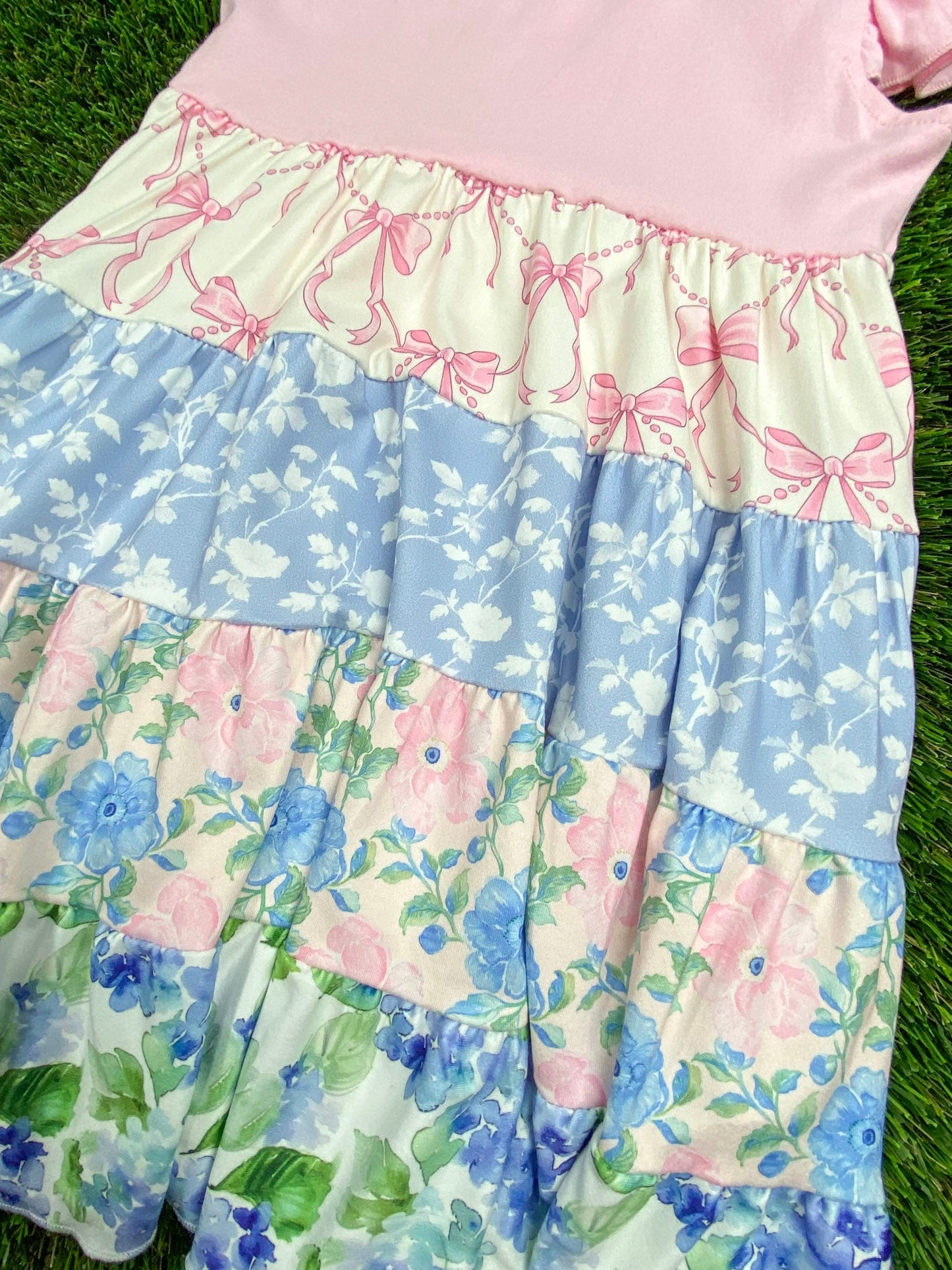 fabric detail on Pink Floral Tiered Twirl Dress for Girls