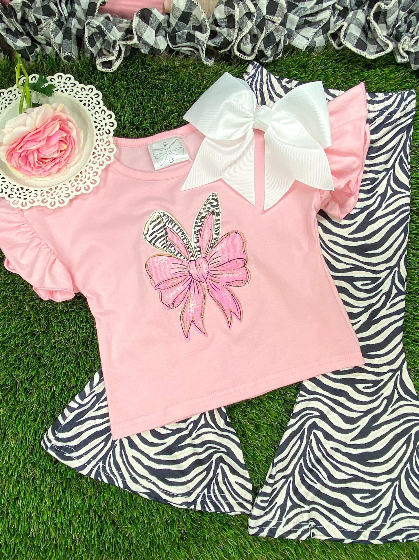 animal print easter girls outfit on grass 