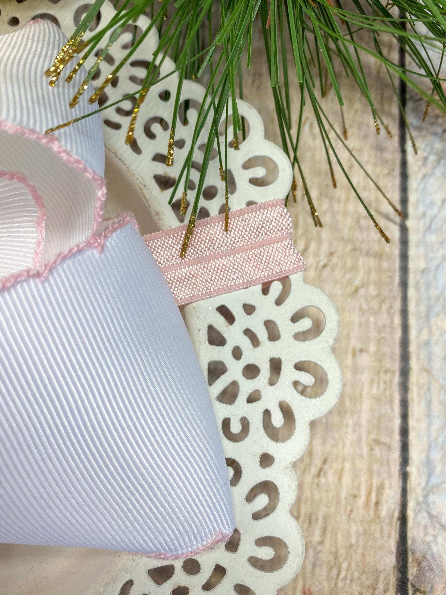 Close up of Pink Christmas Tree Embroidered Bow Headband