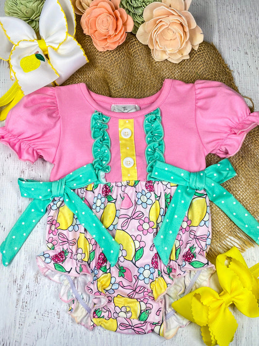 Lemon and bow print bubble romper on marble