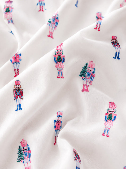Close-up of pastel pink nutcracker print fabric - Alternative view