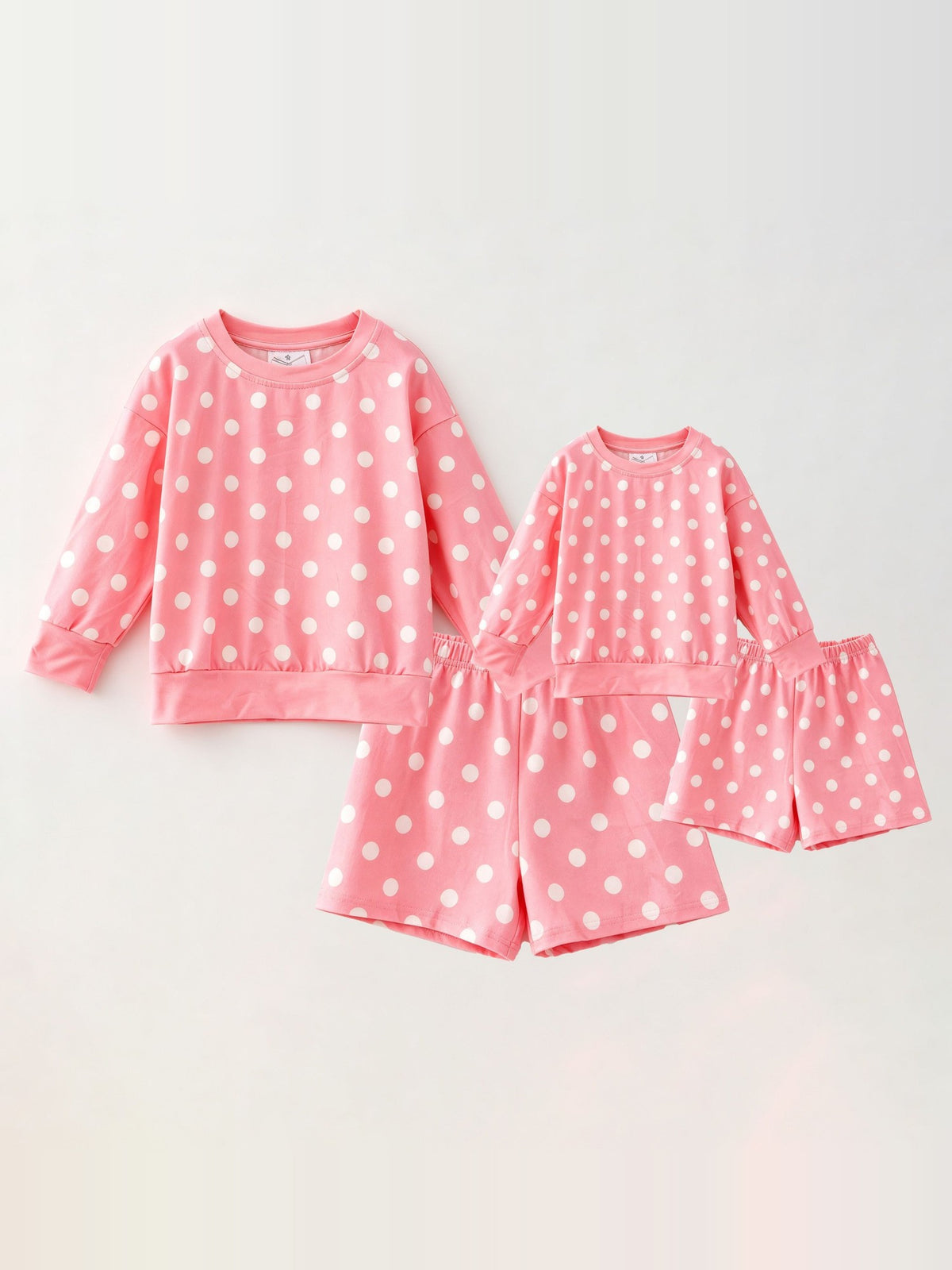 Matching pink polka dot lounge sets for mom and daughter