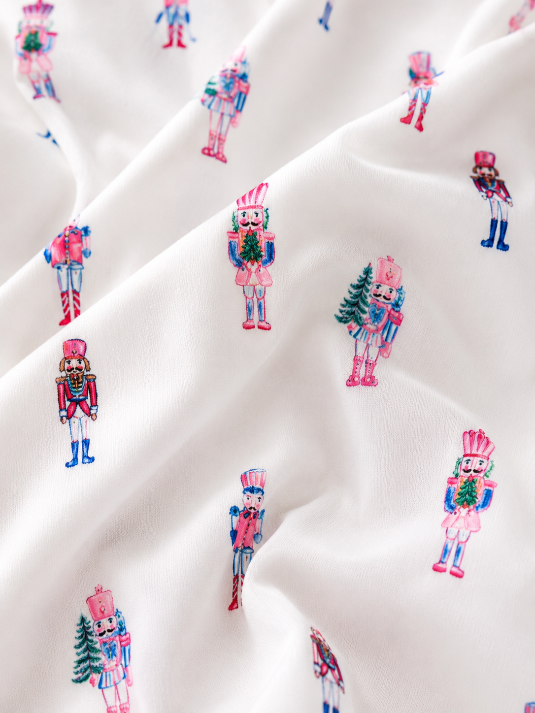 zoom in image of pink nutcracker fabric