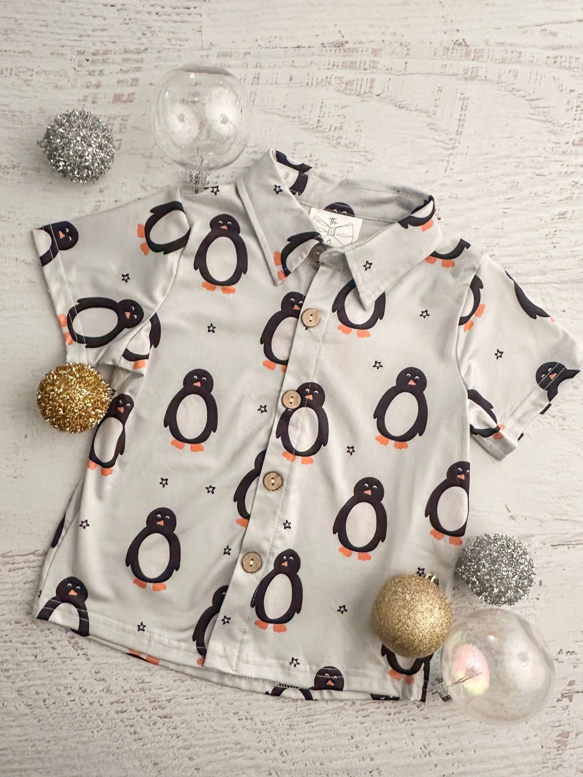 Penguin print boys button down shirt with holiday ornaments
