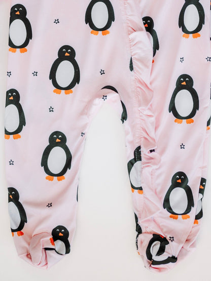 Baby leggings with penguin pattern on a pink background