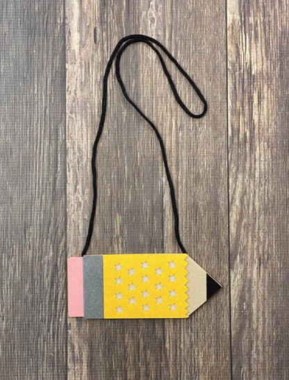 Crossbody purse in shape of a pencil. Felt accessory for back to school.