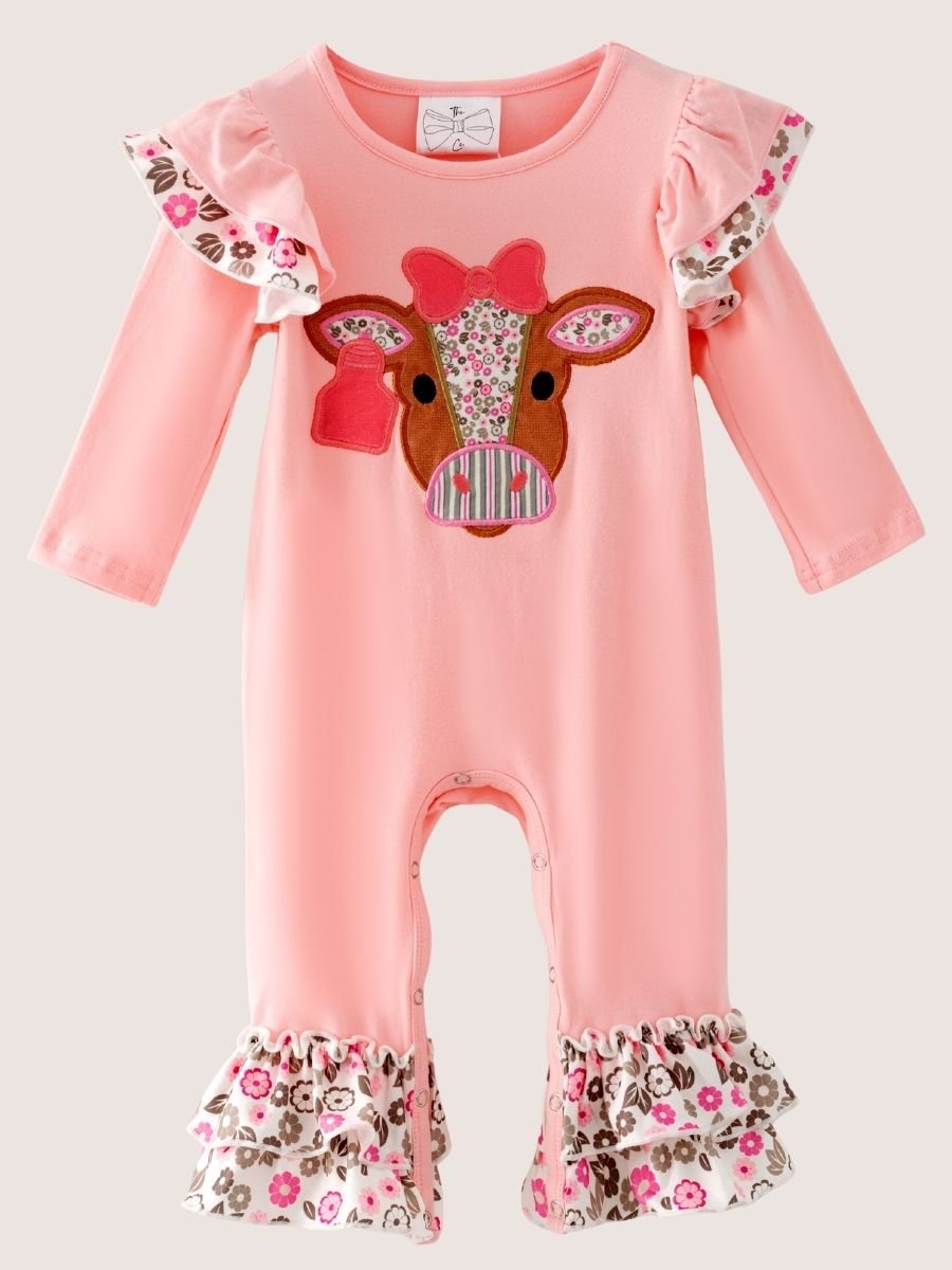 baby girl western one-piece with floral cow appliqué and layered floral ruffle leg hems