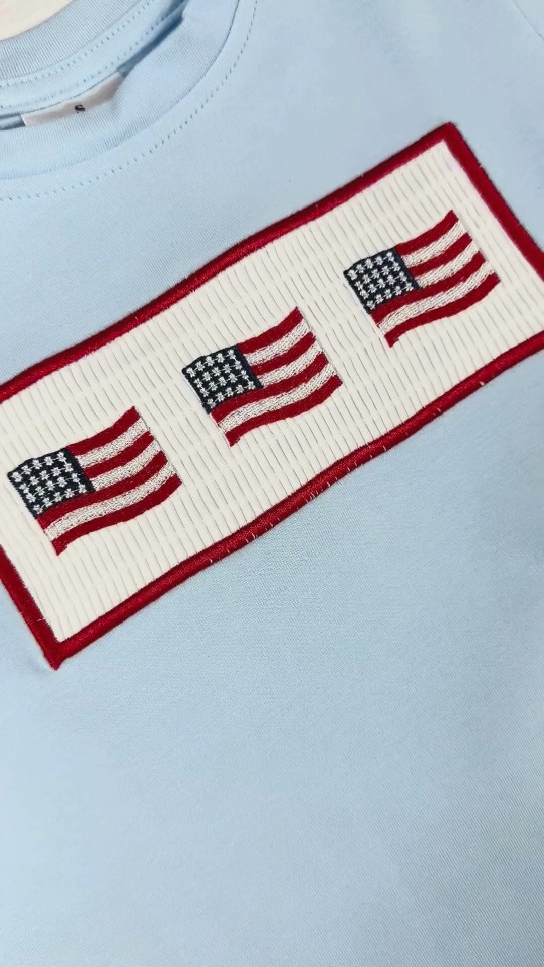 video of the American Flags Tee and Plaid Shorts Boy's Set