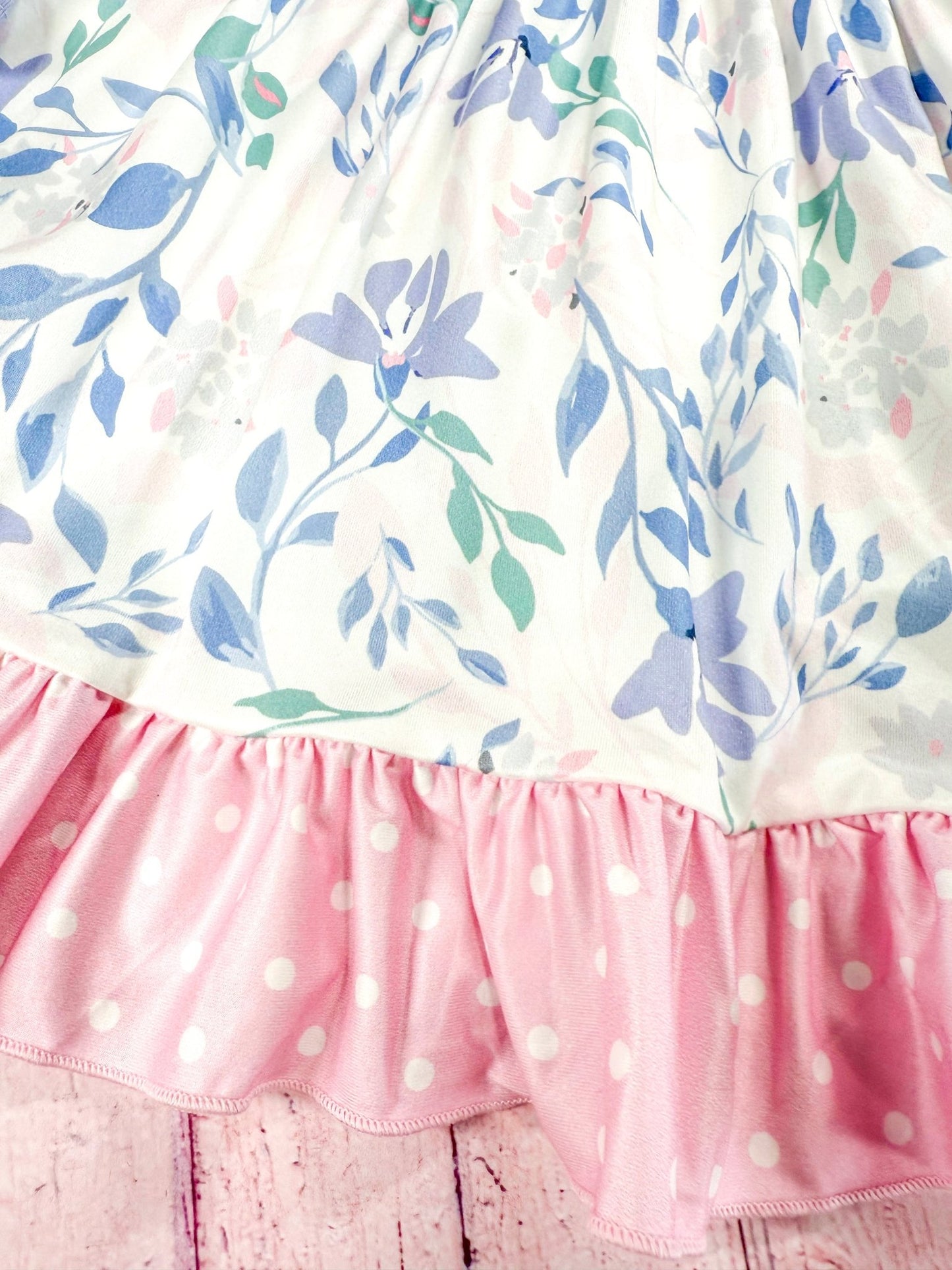 close up of the floral patterns on tiered skirt