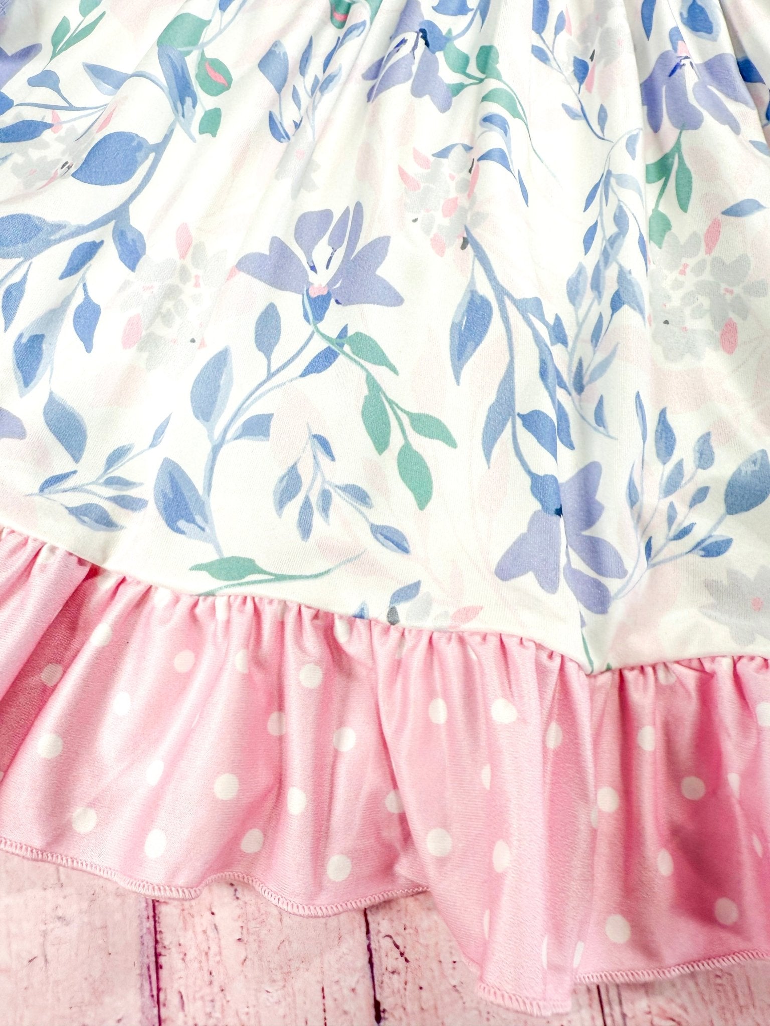 close up of the floral patterns on tiered skirt