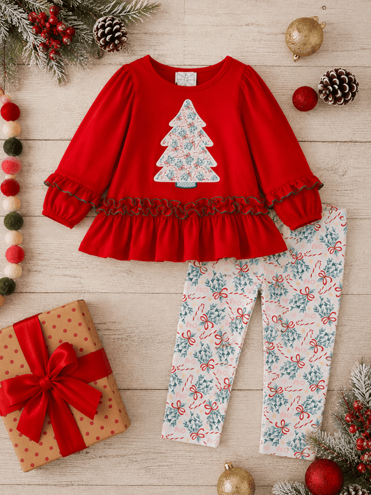 Girls Christmas tree outfit flat lay with red ruffle tunic, holiday print leggings, and festive boutique styling.