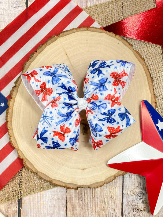 Red White & Blue Bow Print on a wooden background