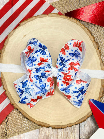 Red White & Blue Bow Print on a wooden background