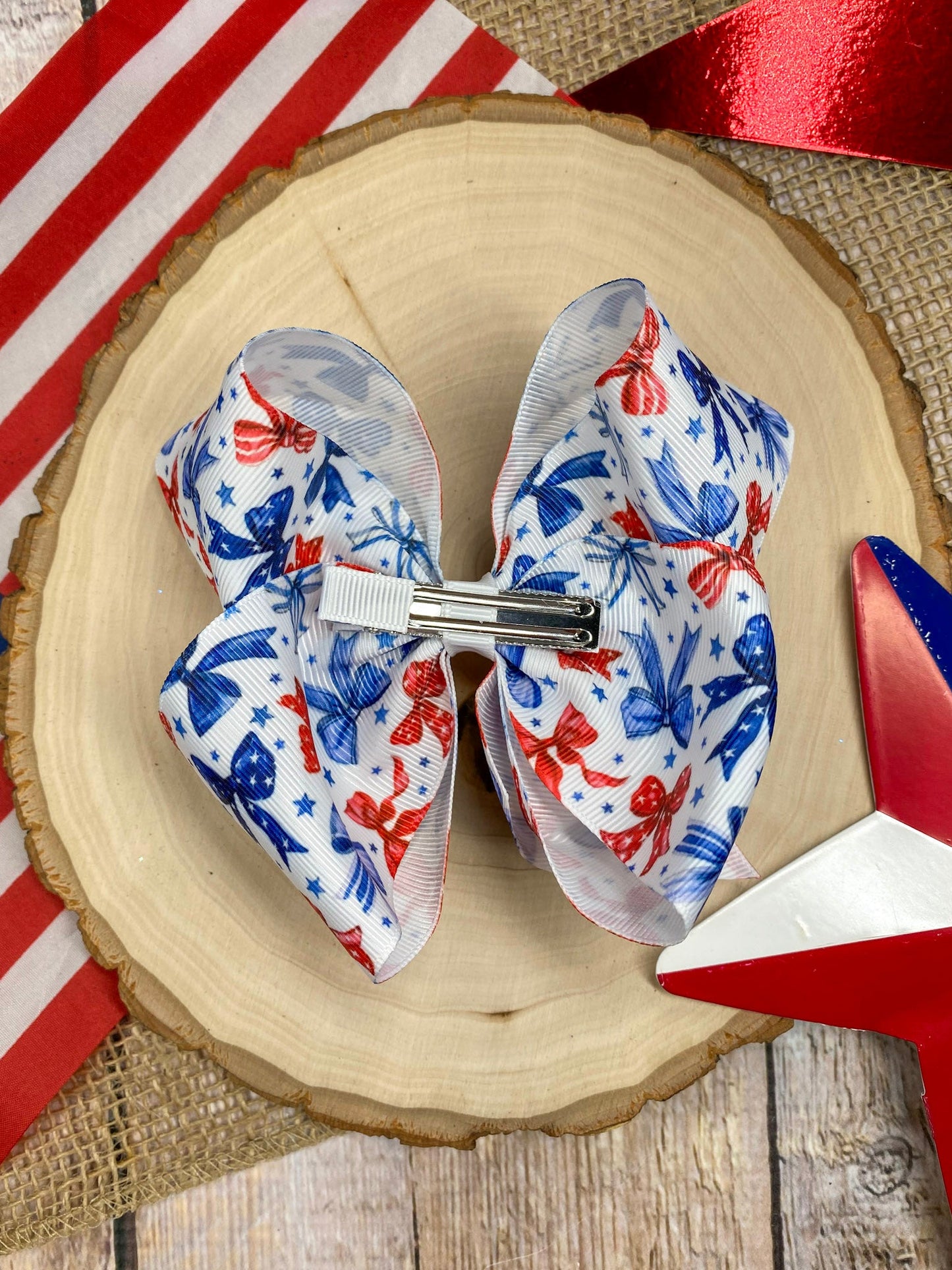 Red White & Blue Bow Print on a wooden background