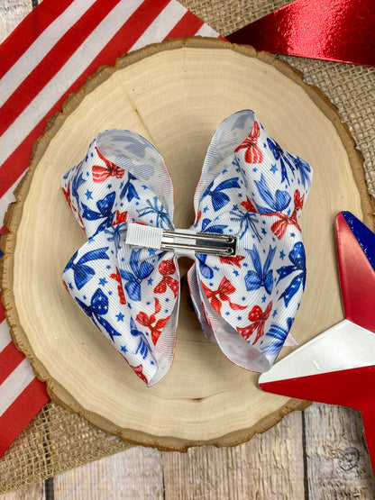 Red White & Blue Bow Print on a wooden background