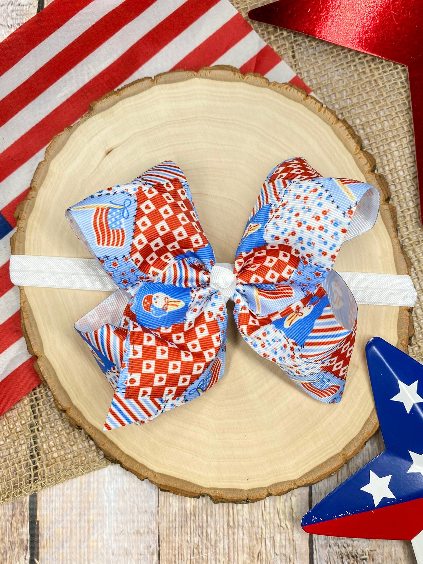 Red White & Blue Patchwork headband on a wooden surface