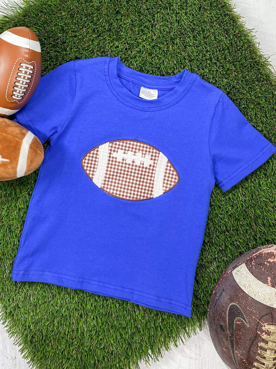 Blue short sleeve shirt with football applique