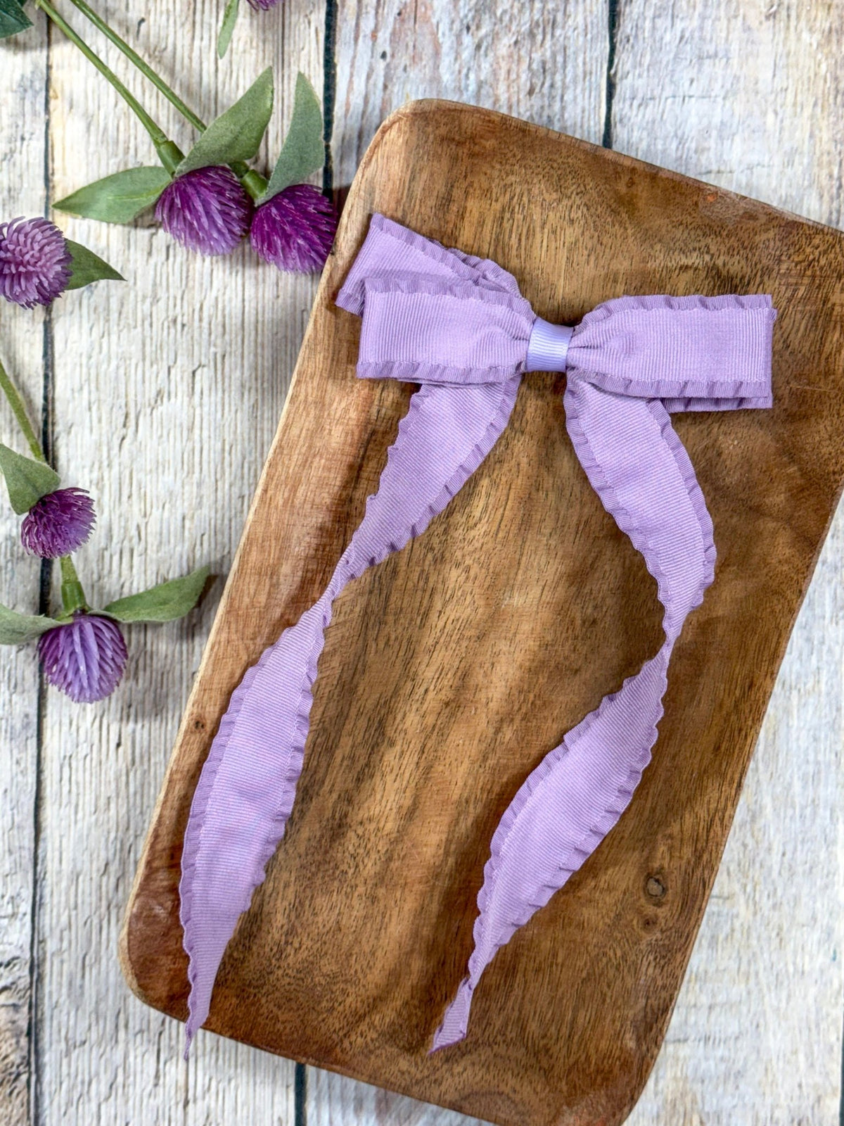 Purple ruffle edge ribbon hair bow on alligator clip
