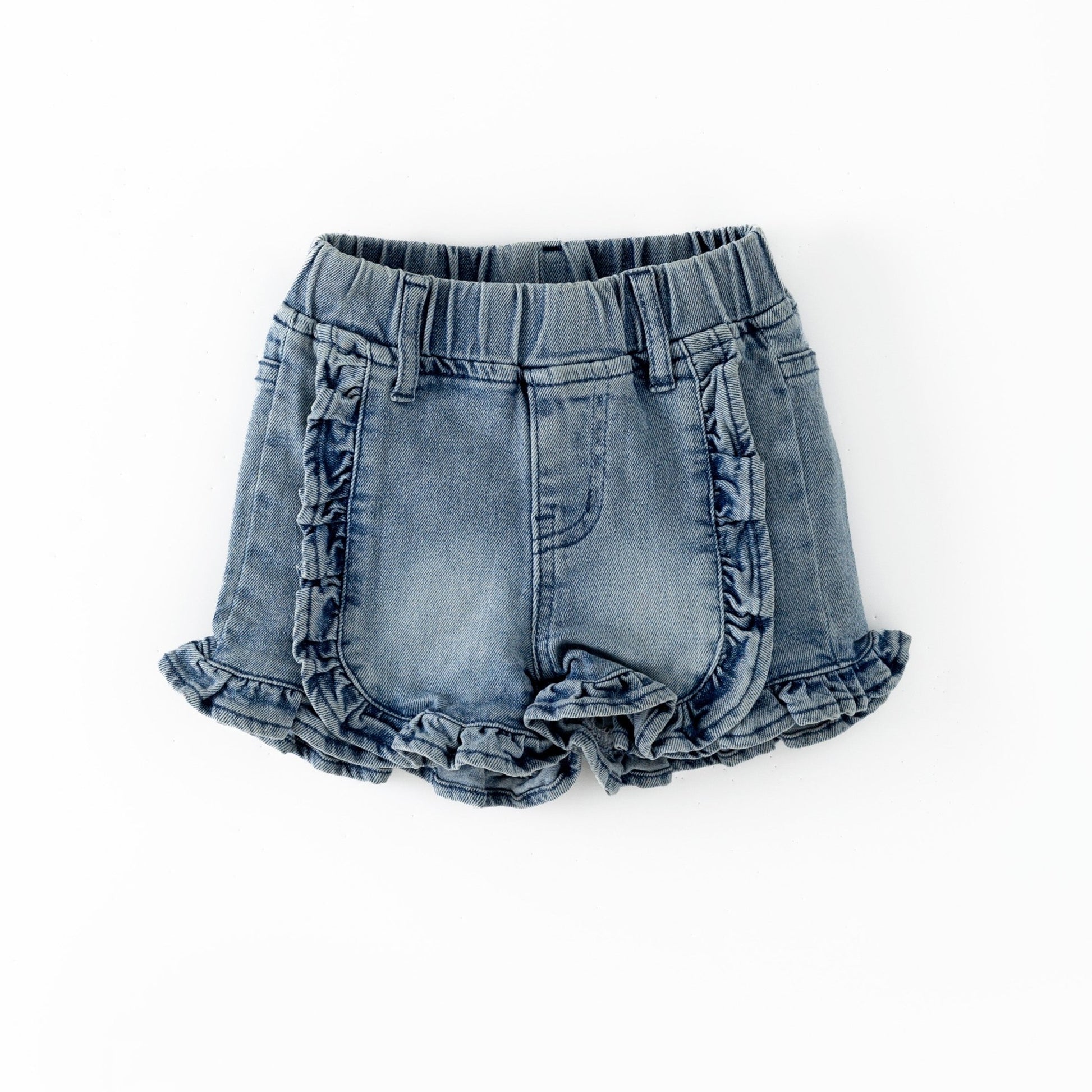 Denim shorts with ruffled edges on a white background