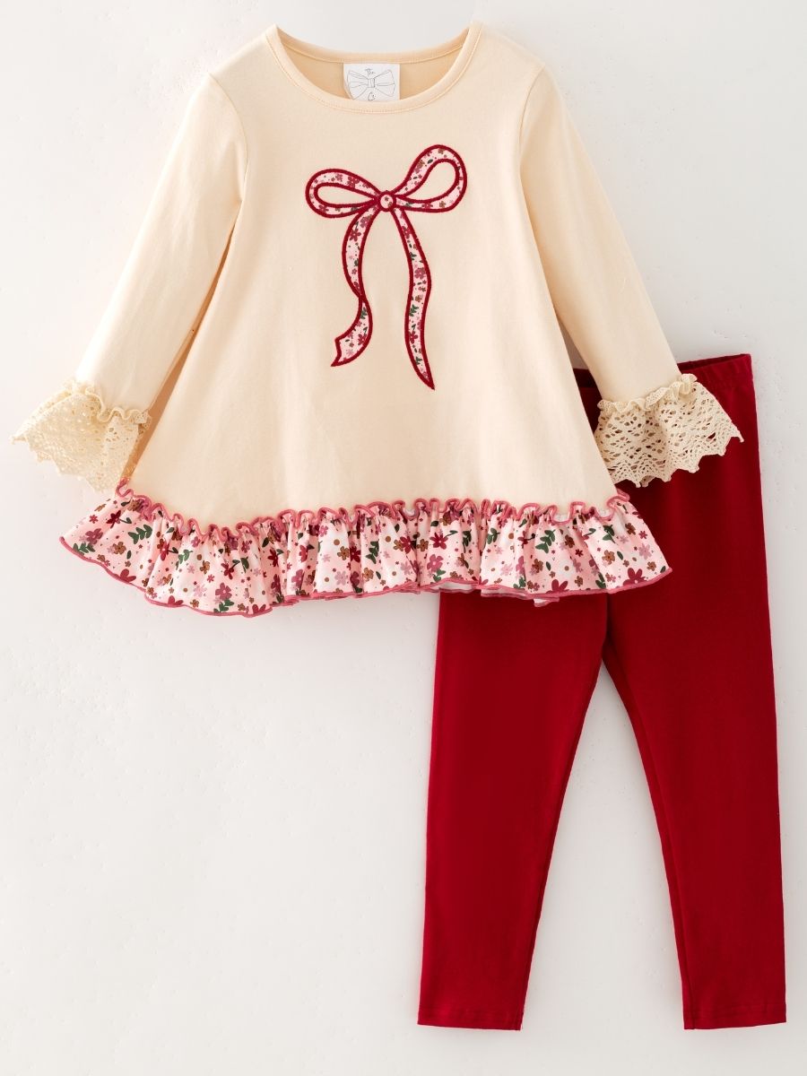 girls two-piece with floral bow appliqué tunic, lace cuffs, and coordinating red leggings