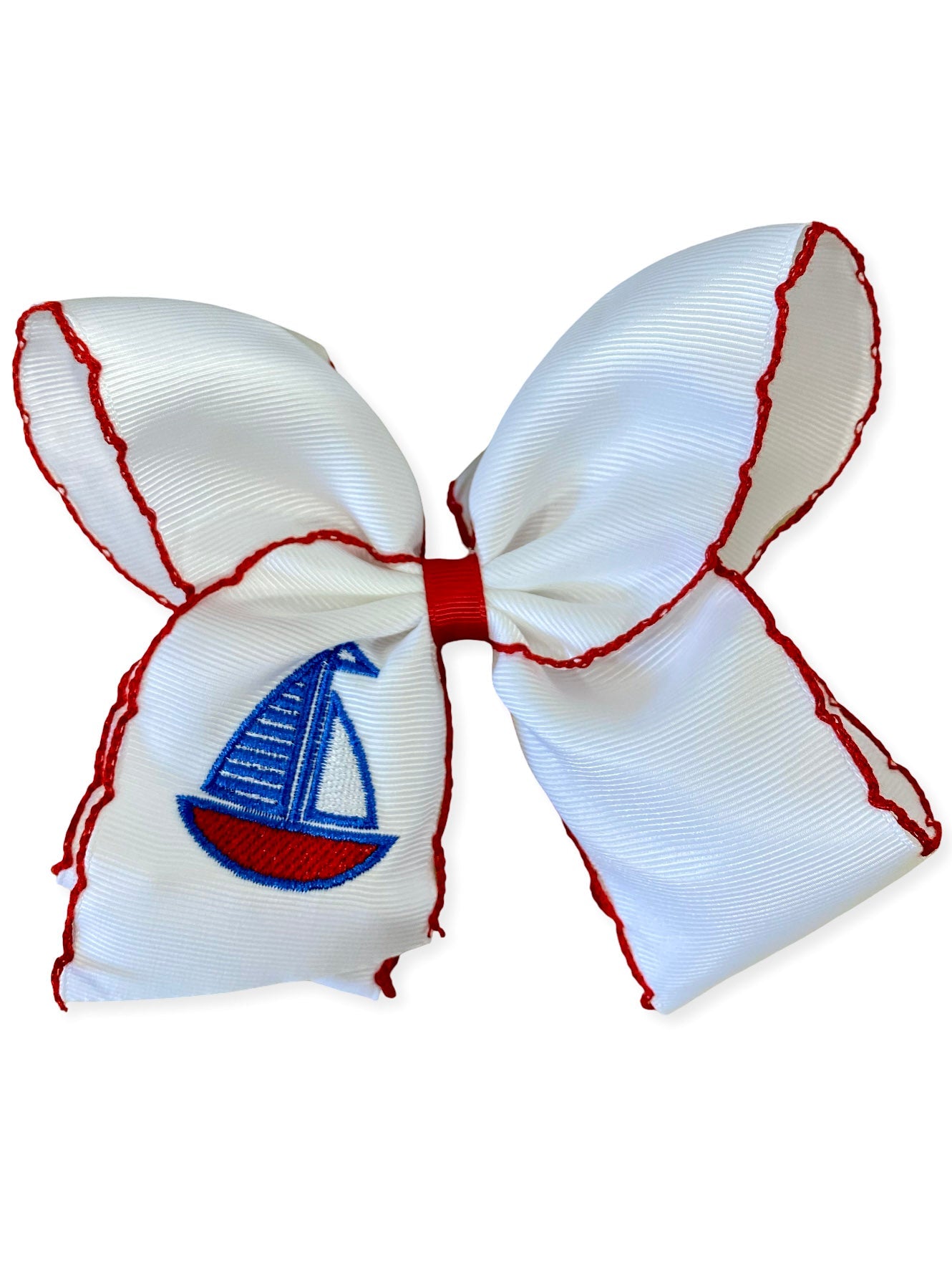 white hairbow with red trim and embroidered sailboat on a white background