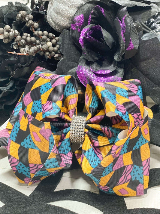 Sally print hair bow with rhinestone center
