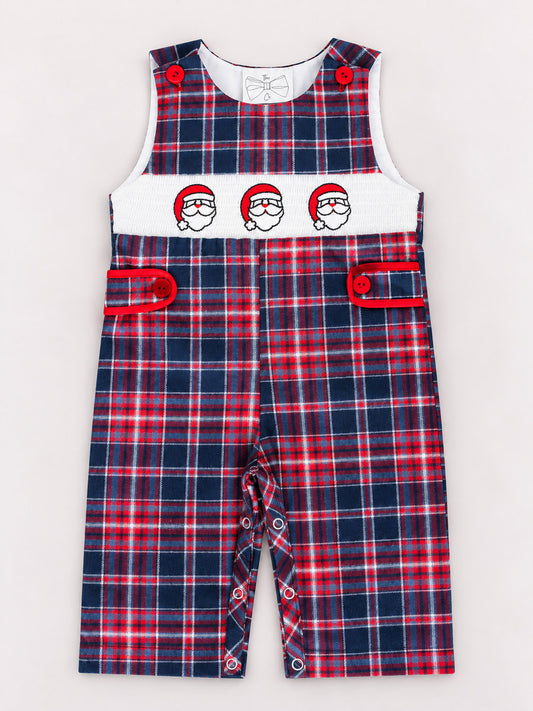 Plaid infant boys Christmas onesie with a Santa face trio appliqué on white backdrop