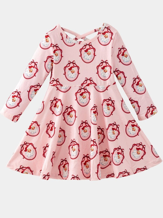 Girls Vintage Santa Christmas twirl dress with long sleeves, pink striped fabric, classic Santa portrait print, and a full twirl skirt on a white background.