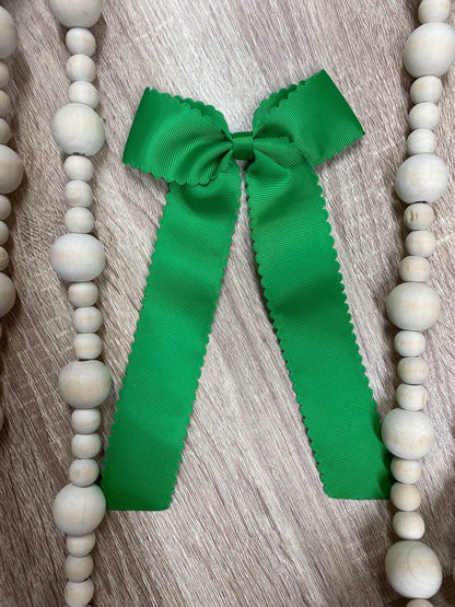 Emerald scalloped long tail hair bow on alligator clip
