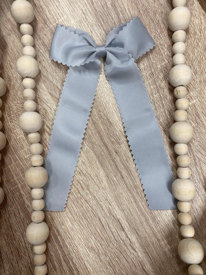 Silver scalloped long tail hair bow on alligator clip
