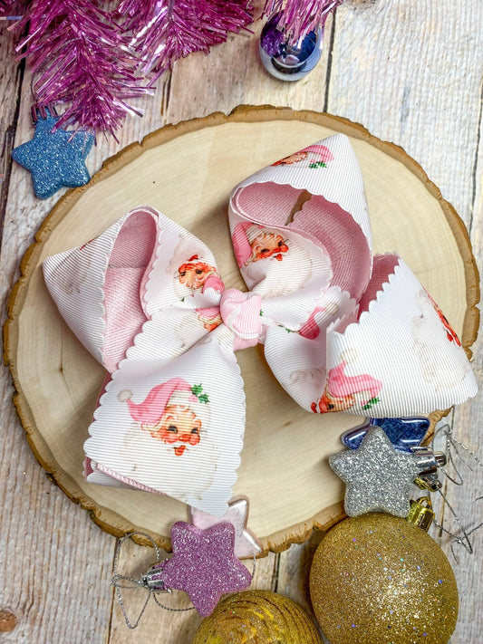 Pink scalloped Santa print glitter hair bow