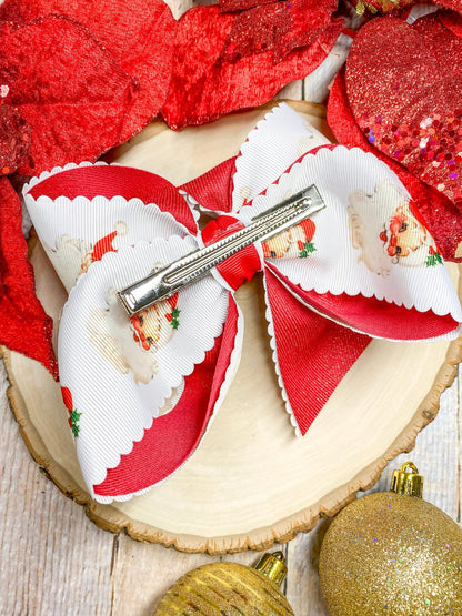 Back of red scalloped Santa print glitter hair bow
