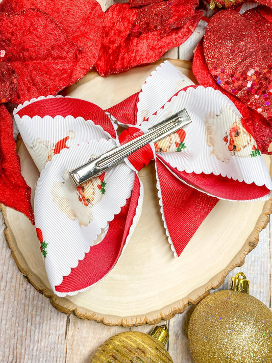 Back of red scalloped Santa print glitter hair bow - Alternative view