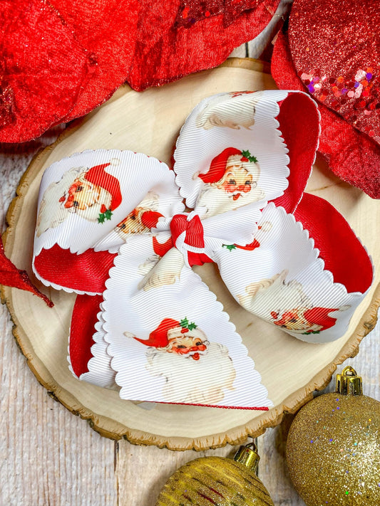 Red scalloped Santa print glitter hair bow