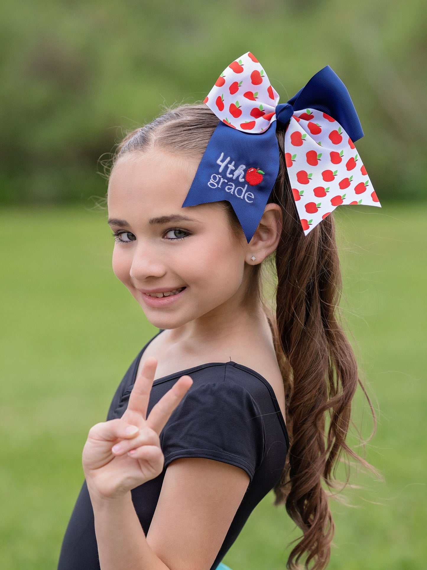 model wearing 4th grade School Grade Embroidered Cheer Bow