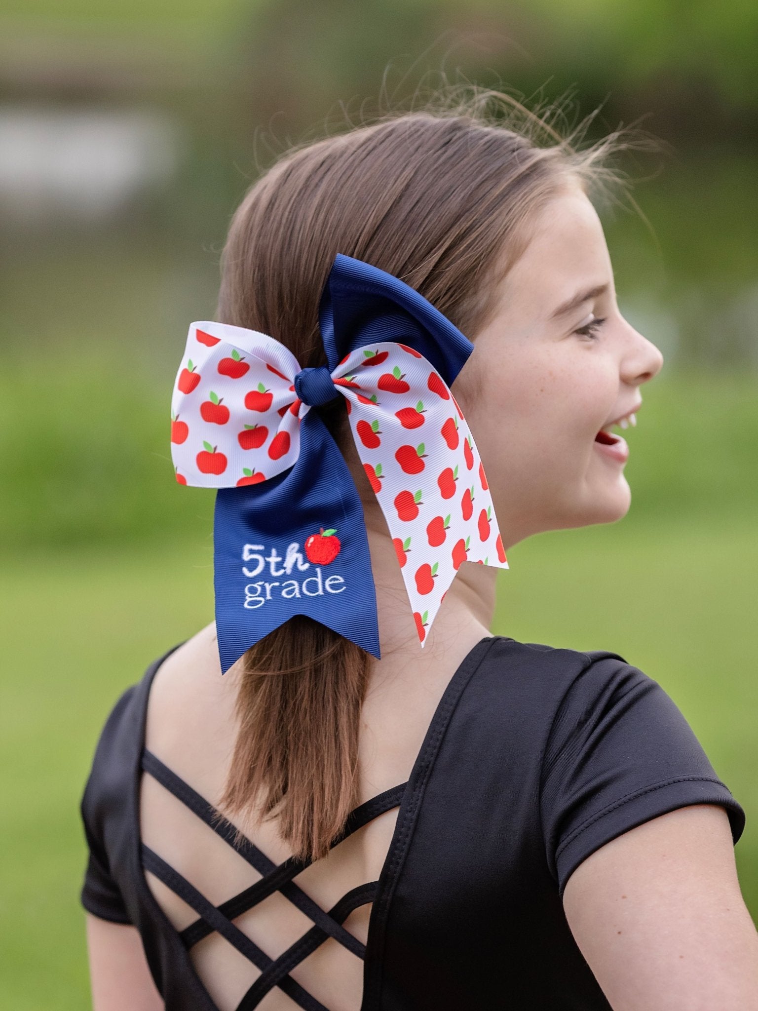 model wearing 5th grade School Grade Embroidered Cheer Bow