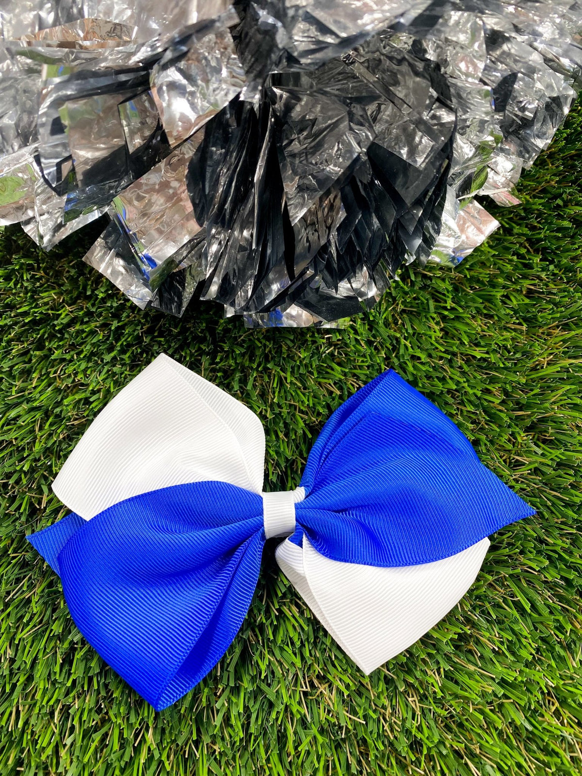 Blue and white oversized school spirit hair bow