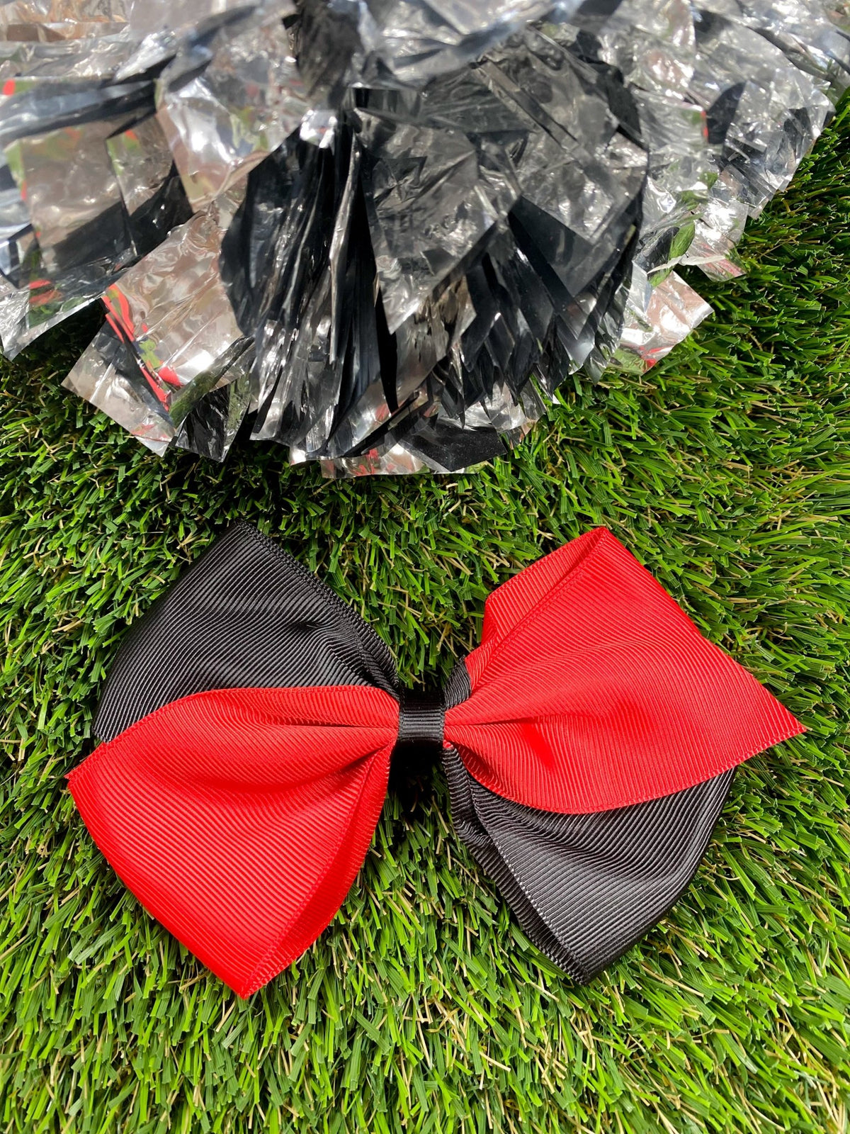 Red and black oversized school spirit hair bow